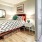 Bedroom with natural lighting and high ceilings