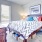 Bedroom with natural lighting and high ceilings