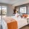 Bedroom with natural lighting and high ceilings